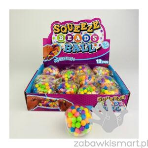 Piłka- przezroczysty gniotek z kuleczkami 6,5 cm- Robetoy